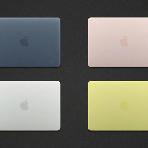 Quatro MacBook Neo vistos de cima em quatro cores diferentes azul escuro, rosa claro, prata e amarelo-esverdeado, sobre um fundo escuro.